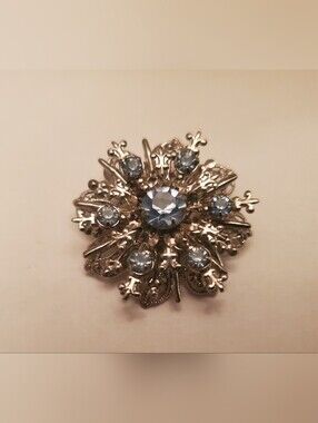 Vintage-Inspired Silver Brooch with Light Blue Crystals